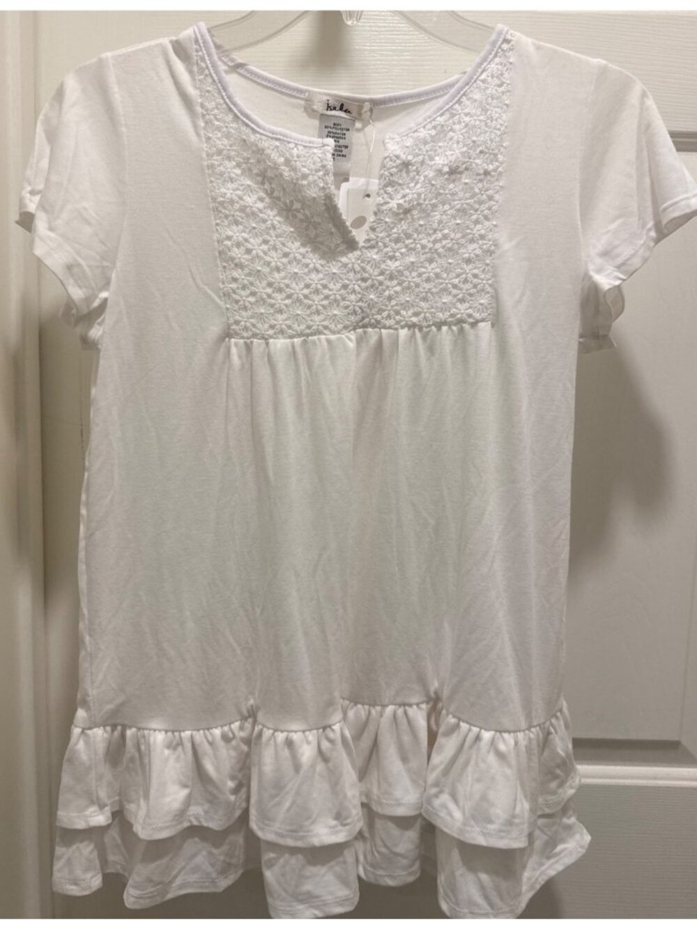 Isela womens S white short sleeve shirt ruffle hem crochet chest NWT V-neck